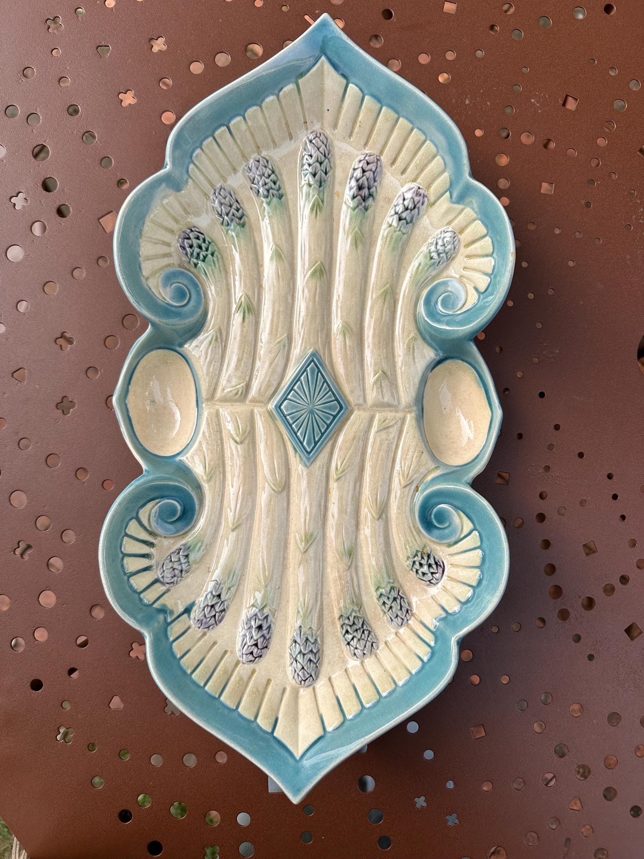Antique majolica asparagus dish – Relief decor and blue scrolls